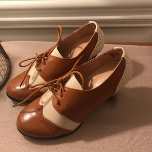 Tan and White Wingtip Dora Pump Heels Size 6.5